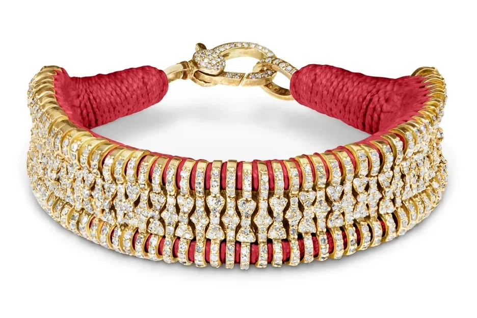 Coral Gold Stacker: coral red thread wrapped around wide gold bands set with rows of natural diamonds, with a pavé diamond clasp