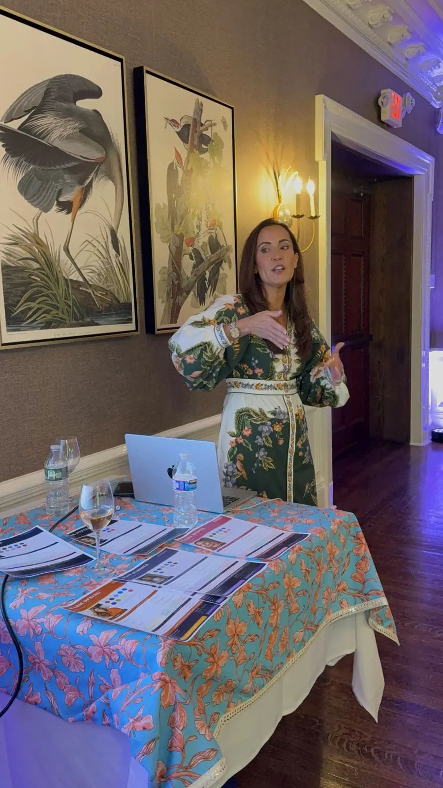 Kate speaking to guests at a private seasonal color analysis event