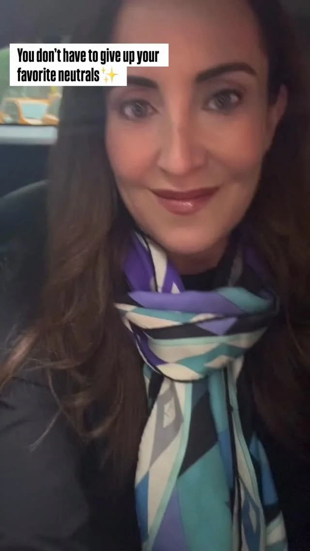 Kate in a blue and purple patterned scarf